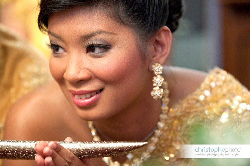 Close up of the pretty bride's face captured by wedding photographer cambodia