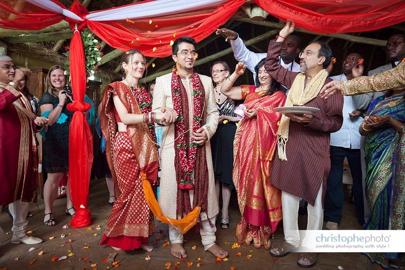 Bride and groom being blessed by the family.