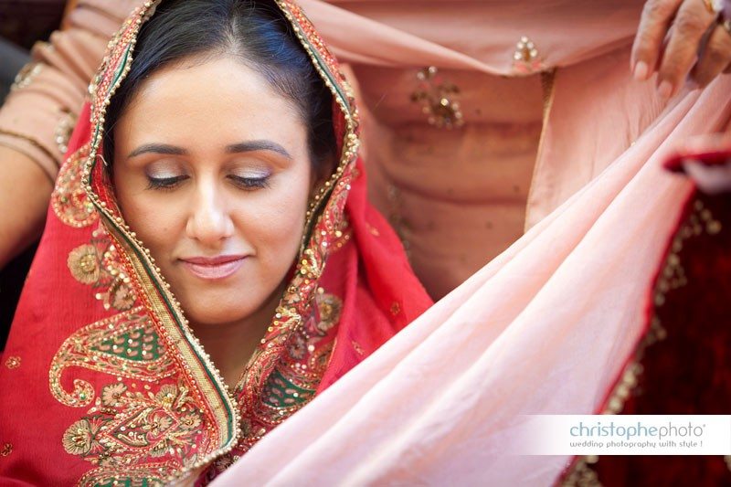 bride getting her scarf during the chunni ceremony in chandigarh, near amritsar, north india