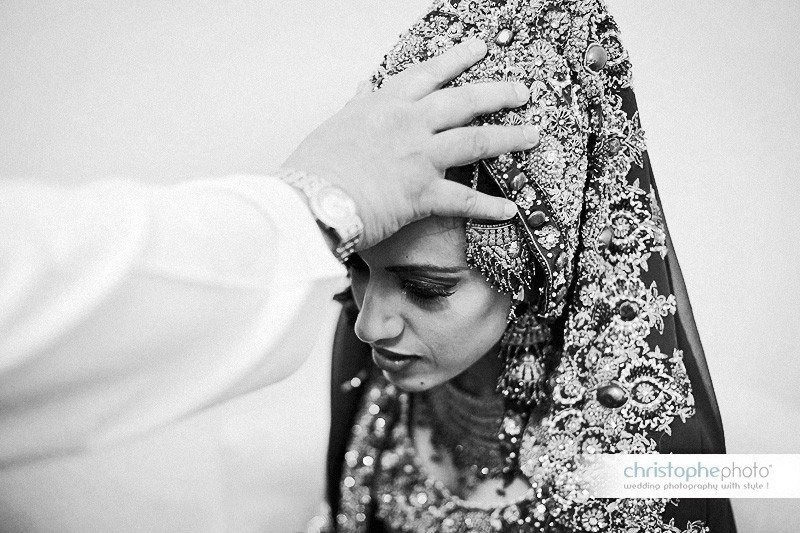 Blessing of the bride by the Ihmam. She is seating on her own in a separate room.