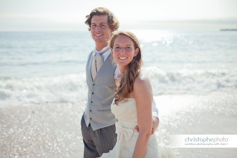 portrait of bride and groom on the beach of La baule by Wedding Photographer France