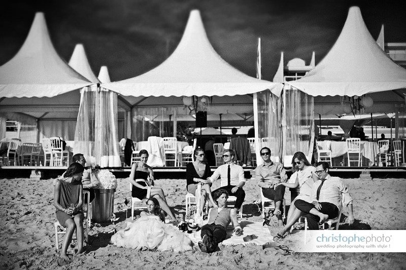 Having a break and taking a sun bath after the wedding lunch. Wedding Photographer France La Baule