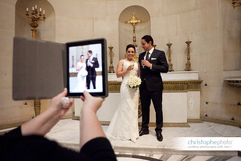 Happy couple after the ceremony having their photo taken by the celebrant with the Ipad.