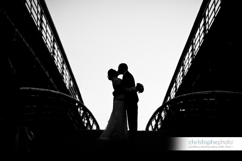 Silhouette in Paris on the Senghor Bridge over the Seine River by Wedding Photographer Paris