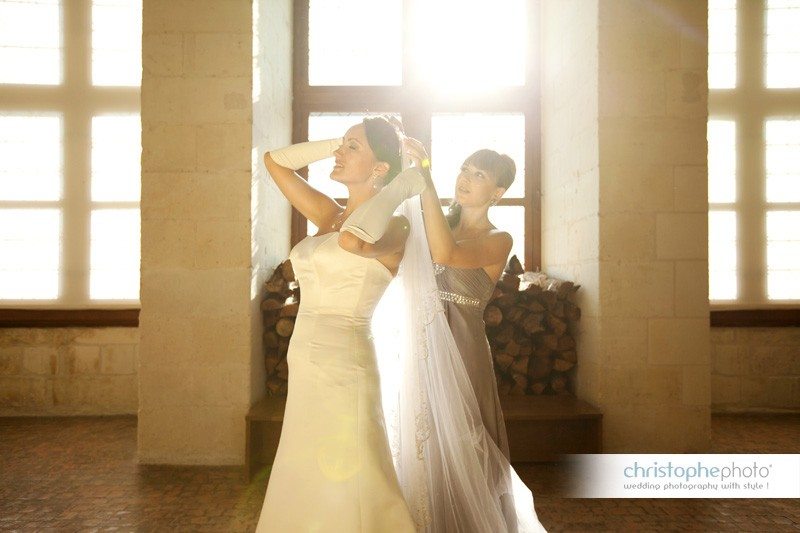 Beautiful flare coming through the windows of the magnificent Chateau de Chambord near Paris. Wedding Photographer France Chateau