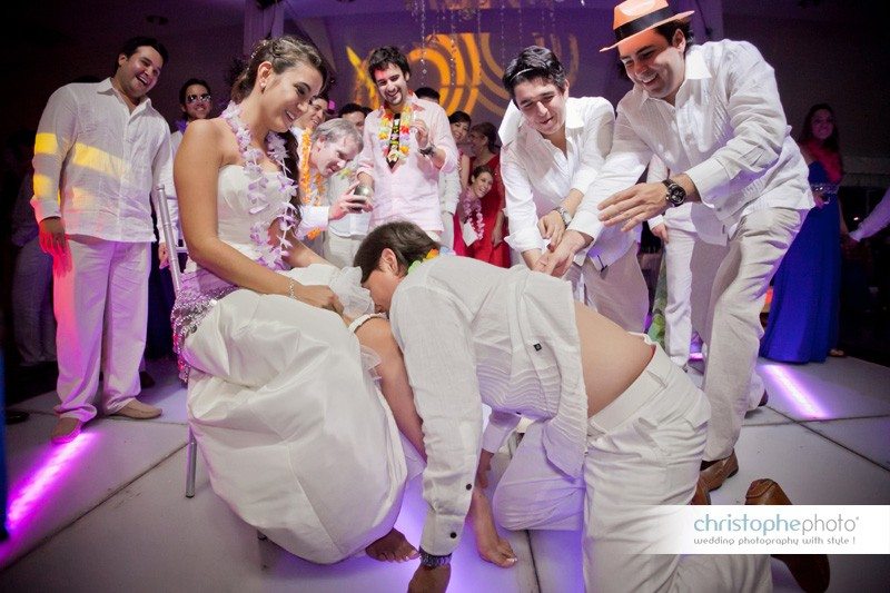 An humorous shot with the bride toward the end of the night by Wedding Photographer Bogota Colombia