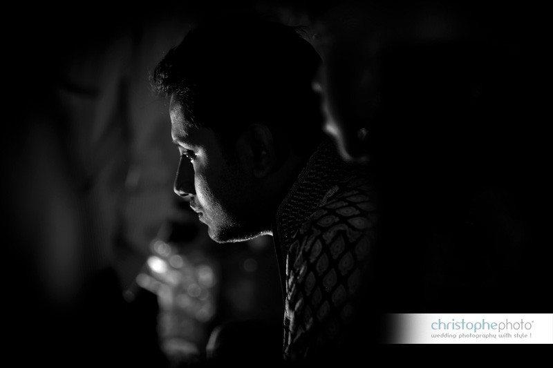 Black and white portrait of the groom gently lit during the engagement ceremony in Port-Blair, Andaman Islands.