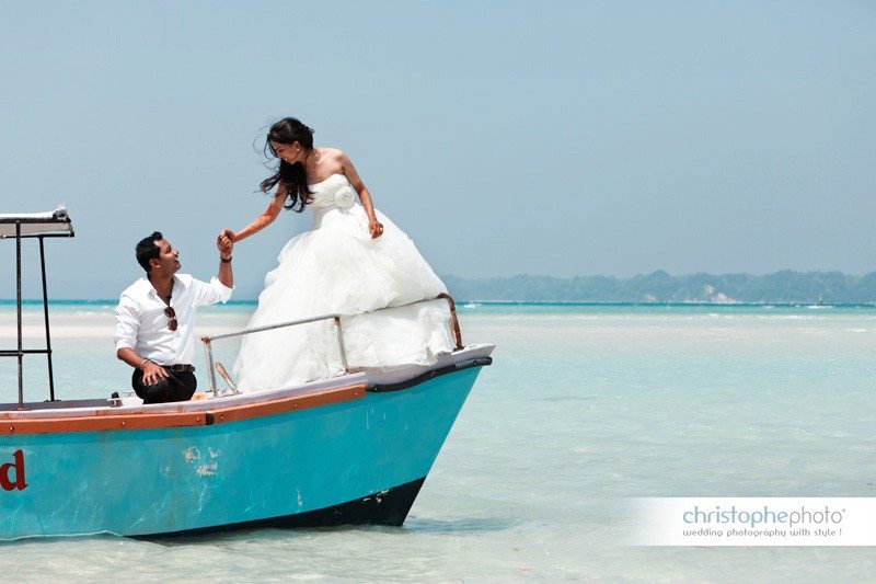Portrait session at the beach. Pristine water and sand patch as a backdrop by wedding photographer india.