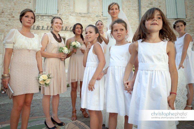 group shots of bride and her bridesmaids and the children before entering the church in Ardeche, France.