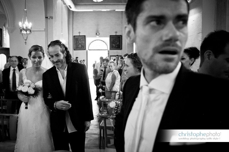 Groom tearing up when the bride walks down the aisle