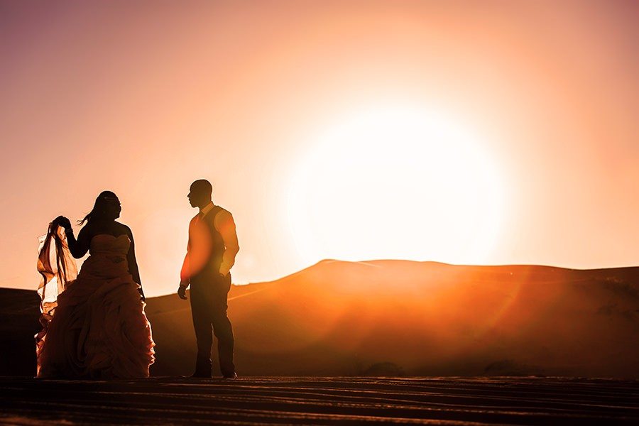 Nigerian Couple during the sunset in Dubai's desert