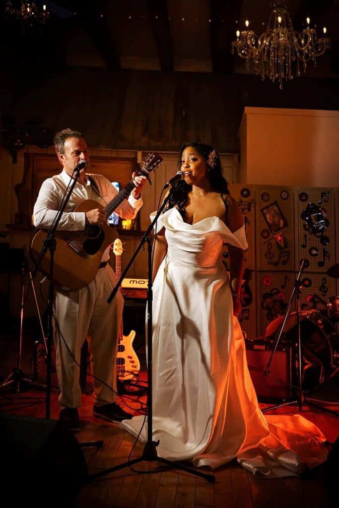 Bride and groom playing music on their wedding day